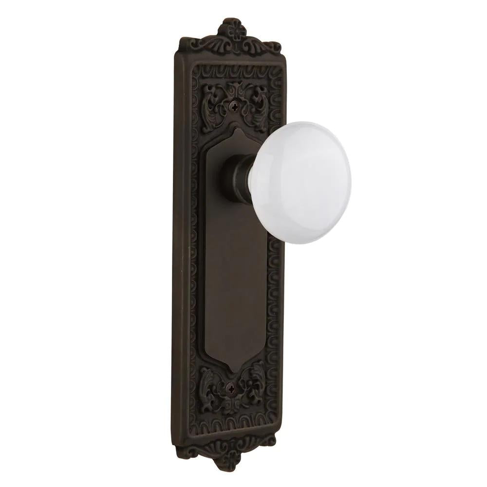 Egg and Dart Plate 2-3/8 in. Backset Oil-Rubbed Bronze Privacy Bed/Bath White Porcelain Door Knob