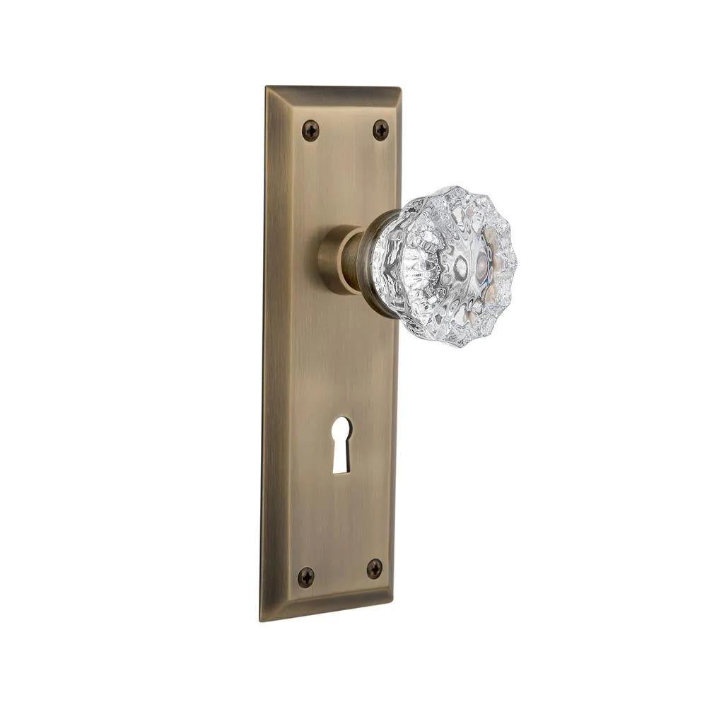 York Plate with Keyhole 2-3/8 in. Backset Antique Brass Privacy Bed/Bath Crystal Glass Door Knob